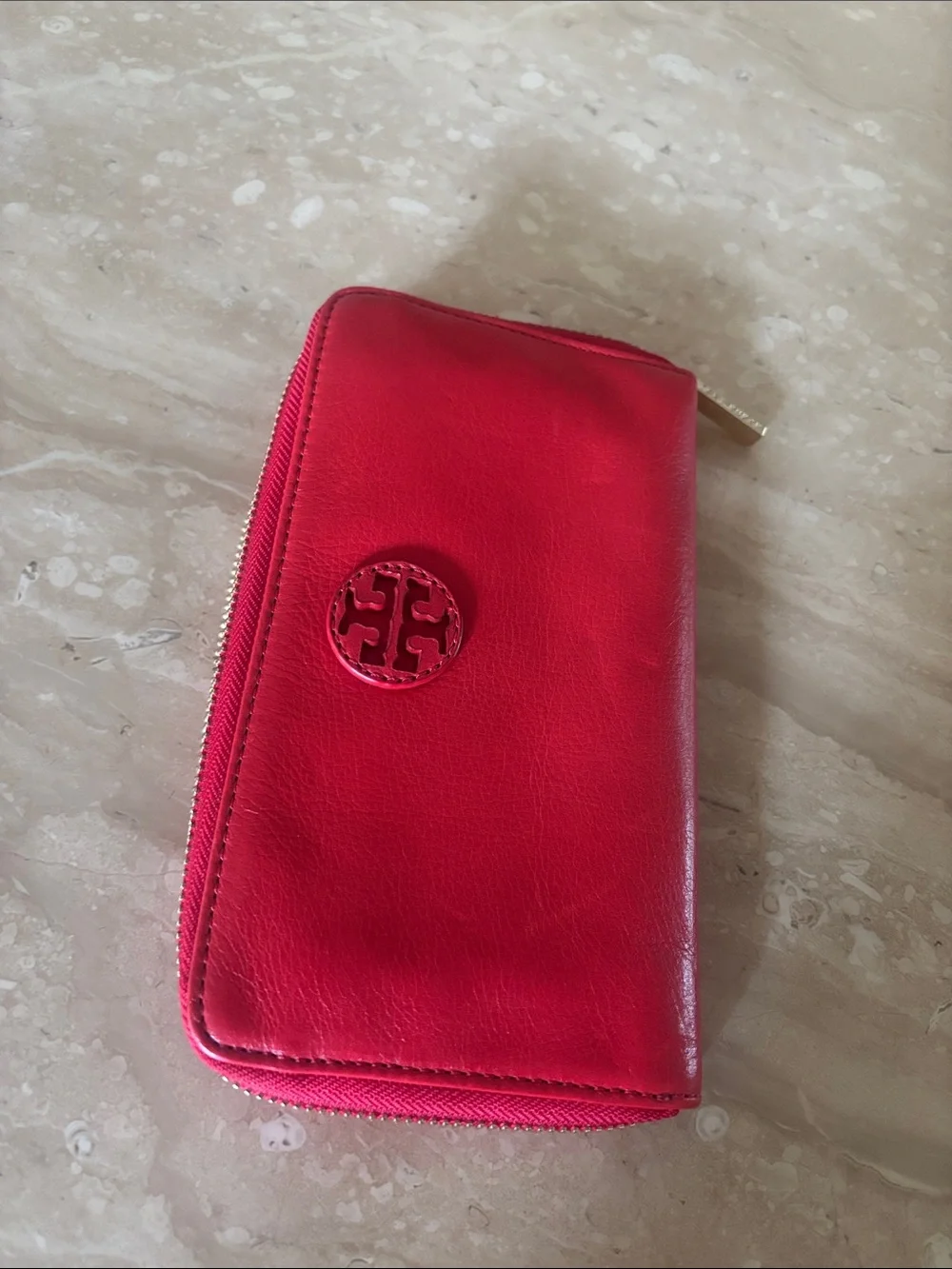 Reddish orange Leather Zip Wallet with Signature Medallion
